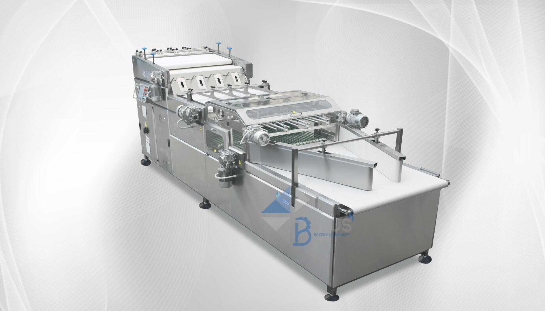 Industrial bread production machine with rollers, conveyor belts, and metal components, set on a light, abstract background. The machine is primarily silver and white, designed for automated dough processing.