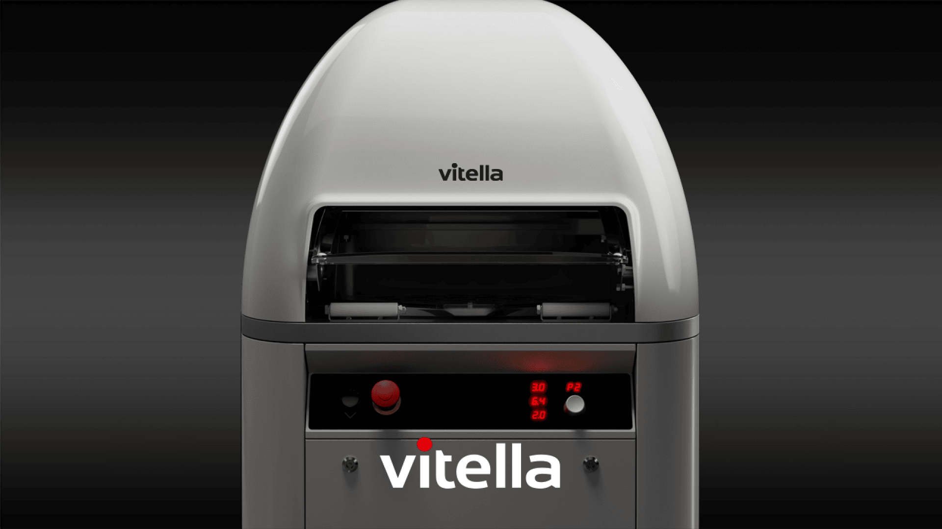 Close-up of a modern, silver industrial machine with the brand name vitella displayed prominently on the front, featuring buttons, a display, and a partially open compartment. The background is dark and gradient.