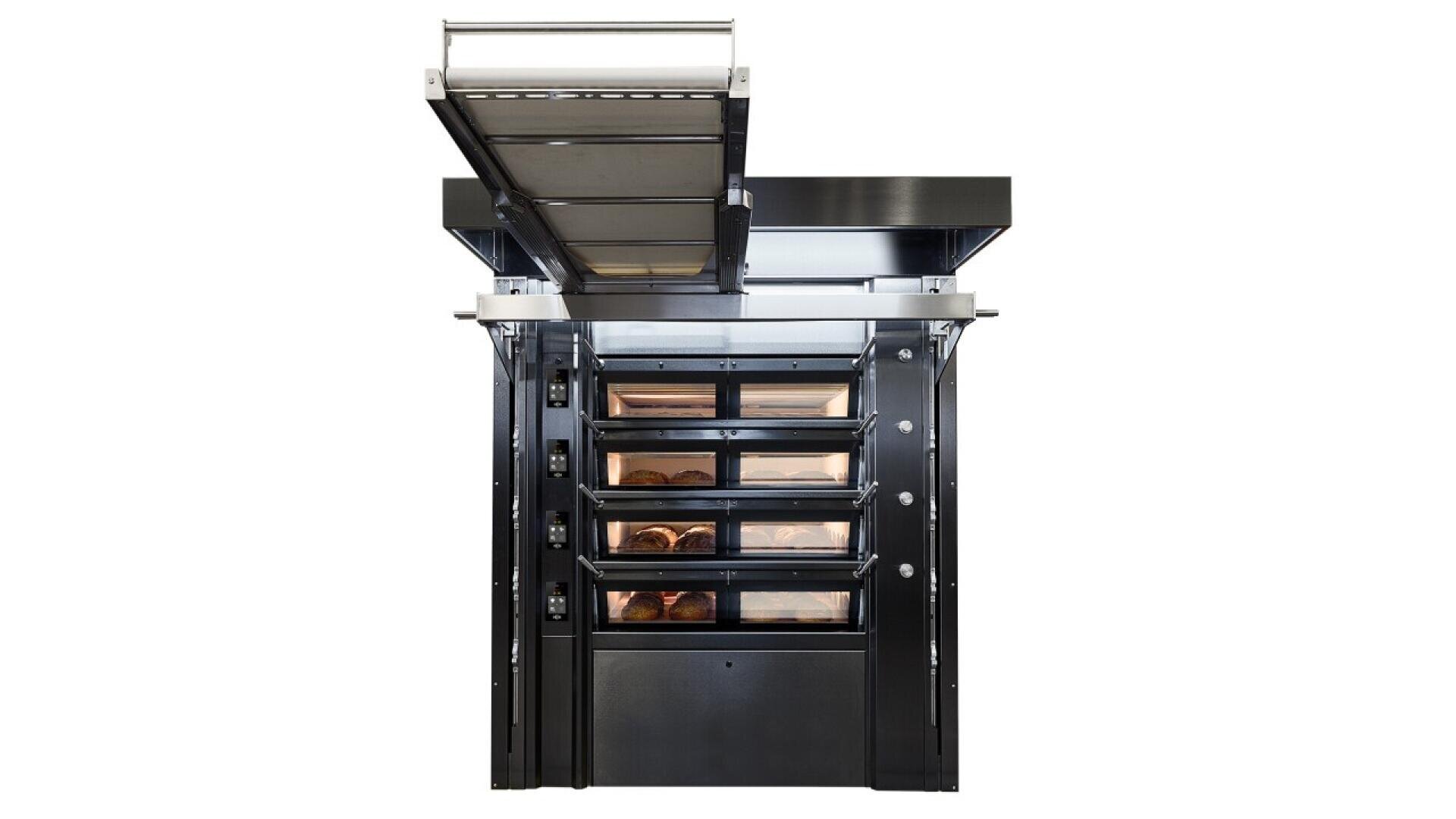 A commercial bakery oven with five stacked compartments, each with a glass door showing baked goods inside. An overhead metal shelf extends outward above the oven. The oven is black with metallic accents.