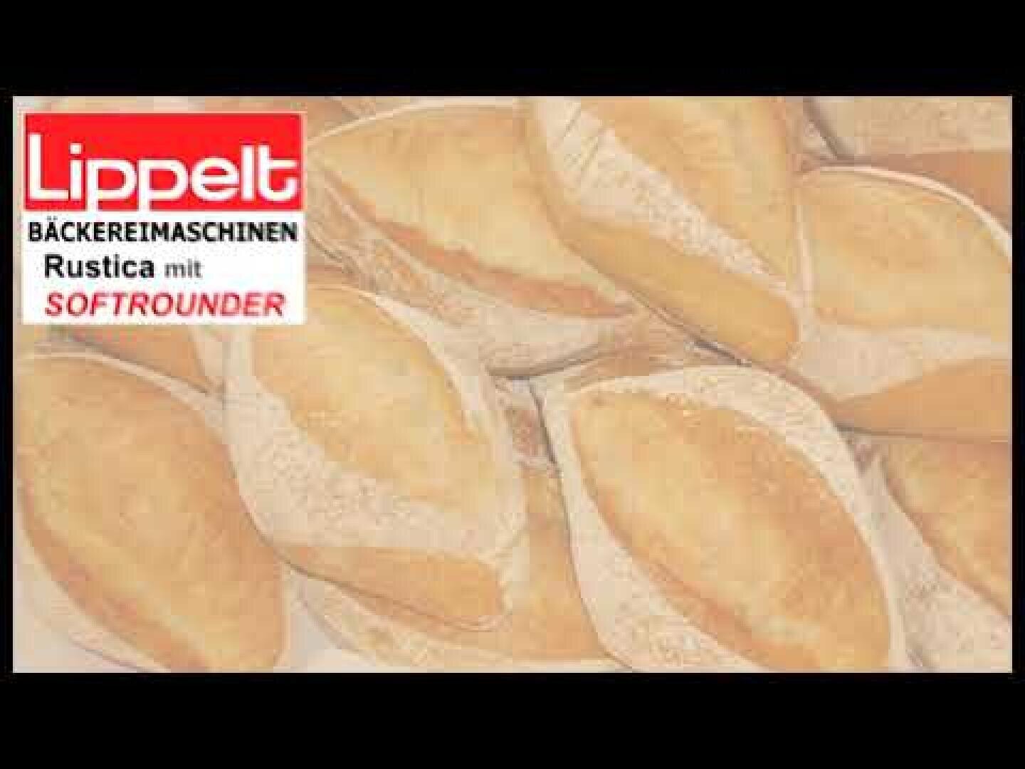 A pile of rustic, oval bread rolls with a golden crust. In the top left corner, there is a red and white logo reading Lippelt Bäckereimaschinen Rustica mit Softrounder.