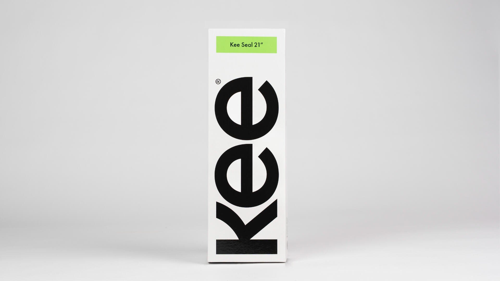 A white rectangular box with the word Kee in large black letters vertically and a green label on top reading Kee Seal 21” against a plain light gray background.