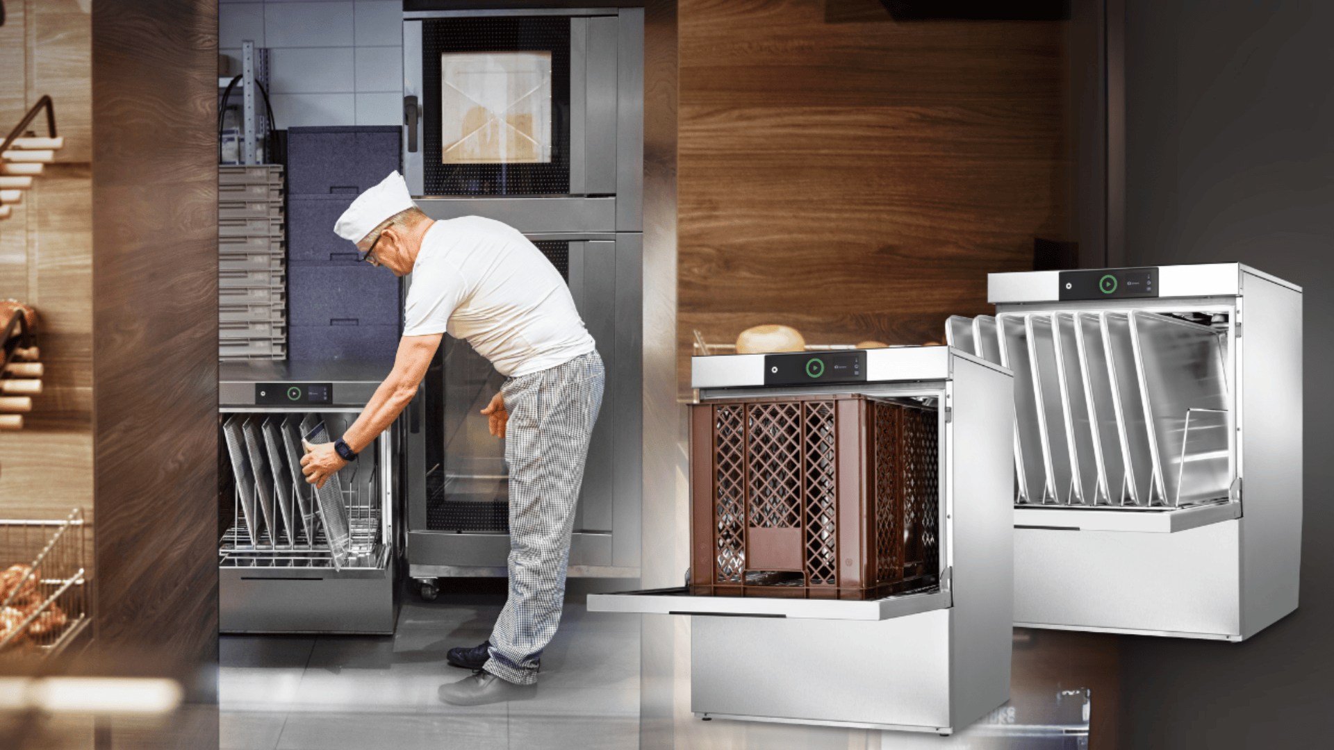 An elderly man in a white hat loads glasses into a commercial dishwashing machine. Two similar dishwashers with glass racks are positioned to the right, all set in a modern kitchen or restaurant environment.