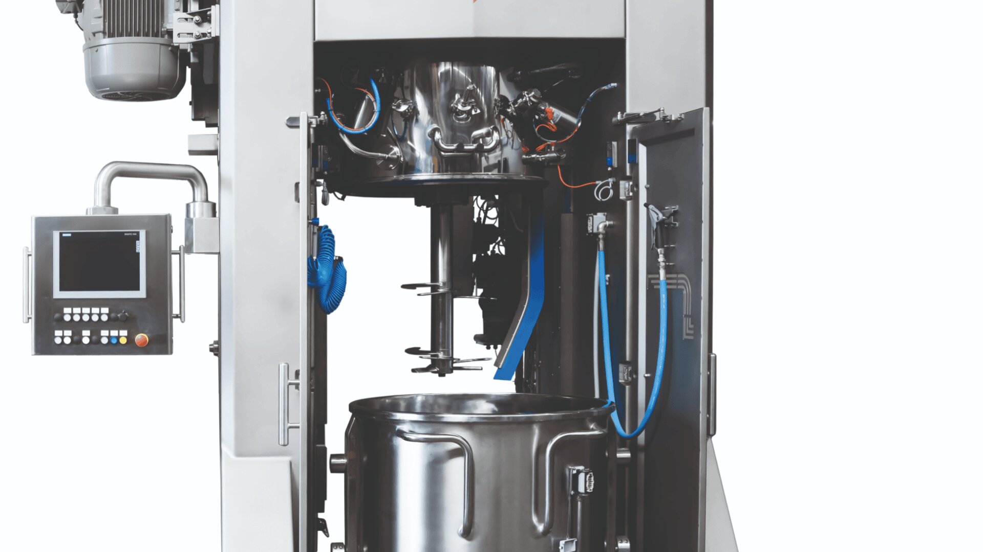 A stainless steel industrial mixing machine with an open front, showing internal components, mixing blades, control panel on the side, and a large mixing bowl below. Blue and black cables run inside the machine.