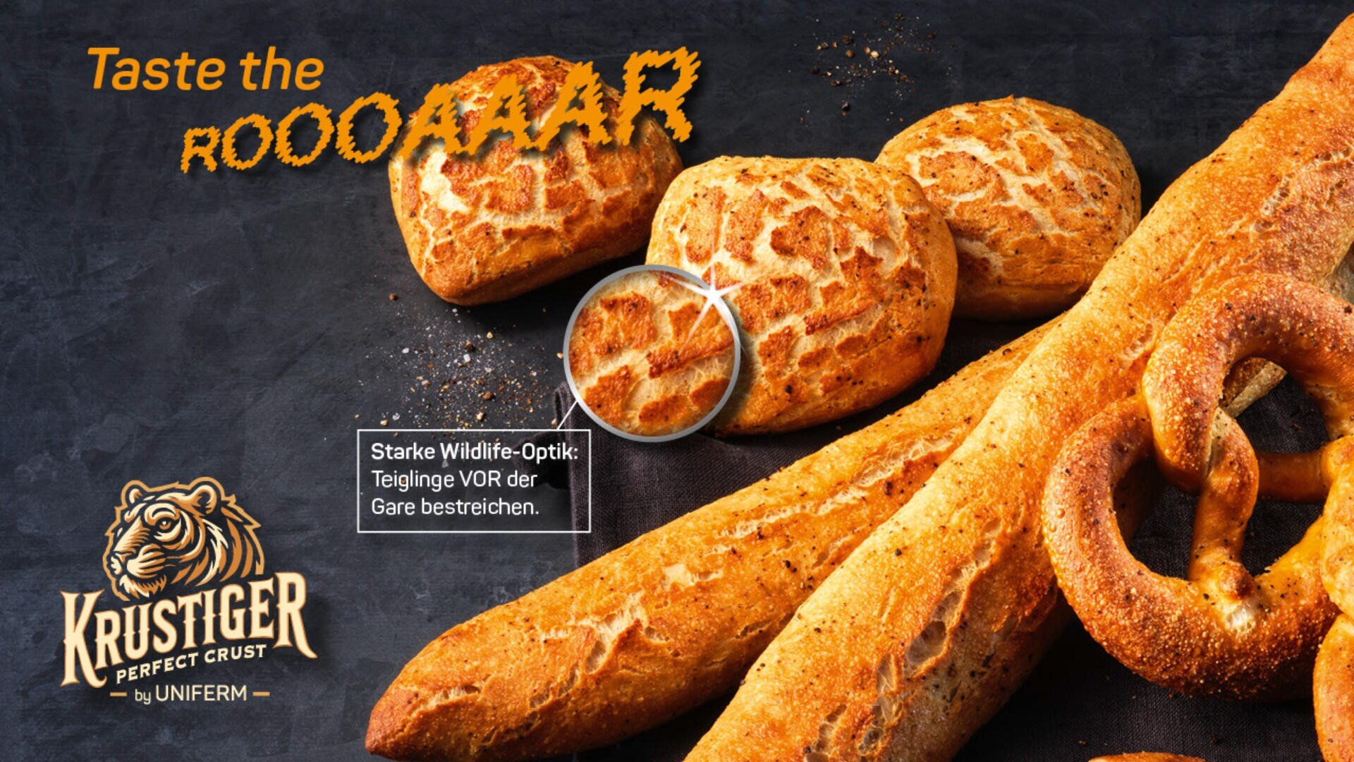 Eine Auswahl an Brotlaiben mit Tigermuster und eine Brezel werden mit dem Text „Taste the ROOOAAR“ und einem Tigerlogo mit der Aufschrift „KRUSTIGER Perfect Crust by UNIFERM“ in der Ecke präsentiert.