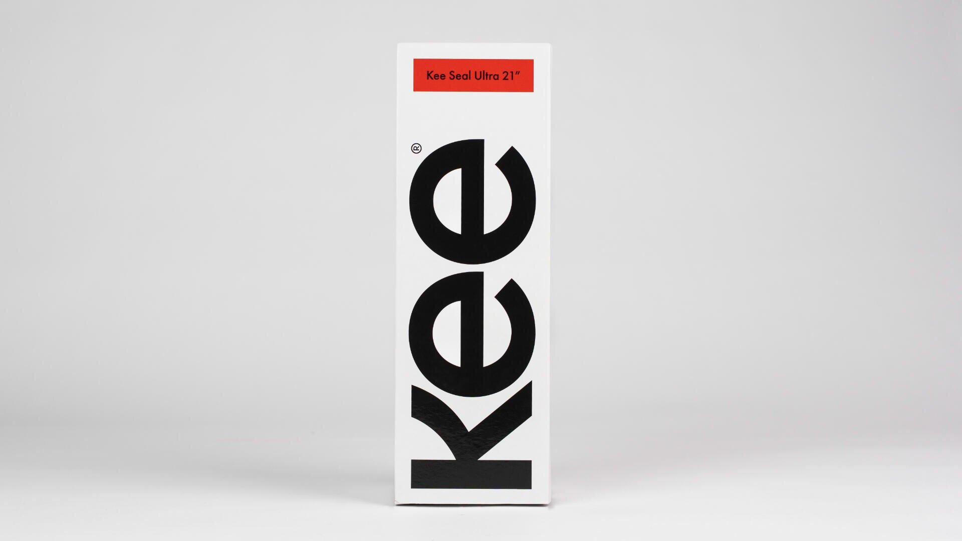 A white rectangular box with the word kee in large black letters vertically and a small red label on top that reads Kee Seal Ultra 21”.