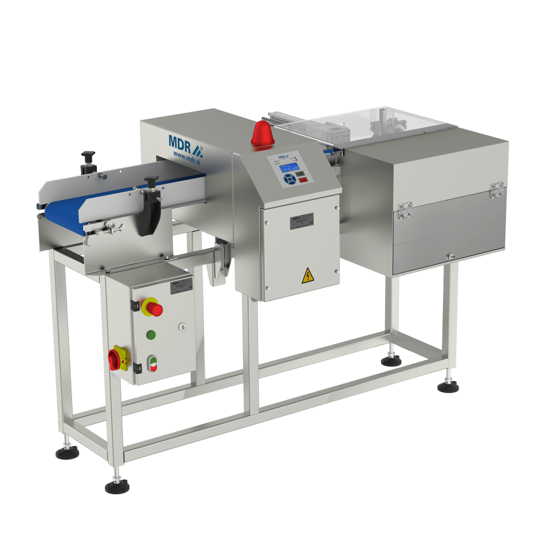 A stainless steel industrial food inspection machine with a conveyor belt, control panel, emergency stop buttons, and a red warning light, used for quality control in food processing.