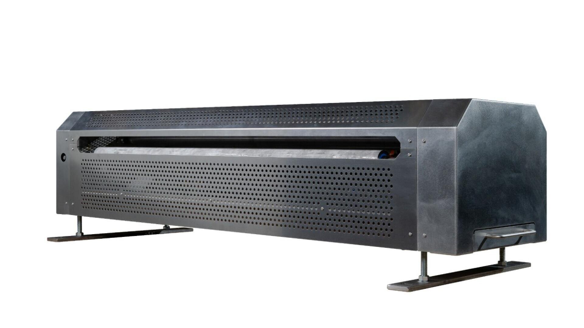 A large, industrial metal machine with a rectangular shape, perforated front panel, and two sturdy legs, likely used for commercial or manufacturing purposes, isolated on a white background.