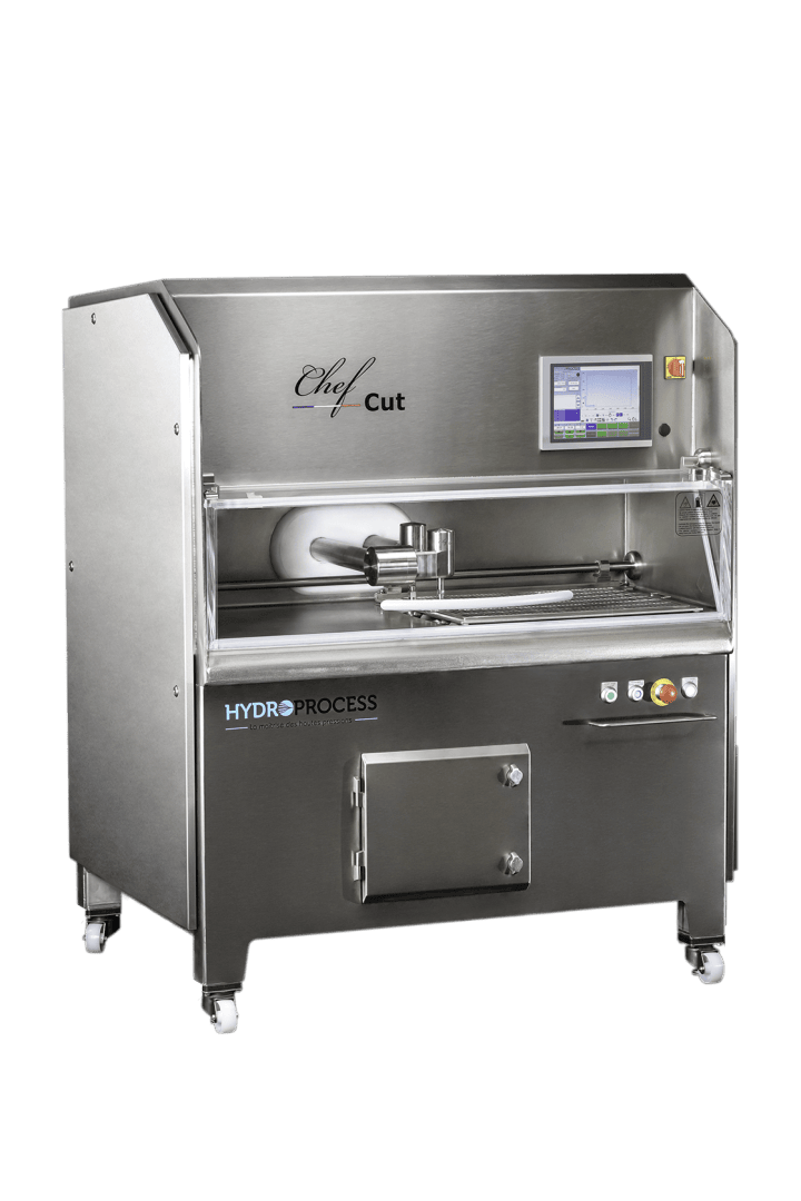 A stainless steel industrial food processing machine labeled Chef Cut with a digital control screen, clear protective cover, and wheels for mobility. The HYDROPROCESS logo is visible on the front.